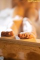 A close up of a person's feet covered in powdered sugar.